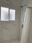 window in shower - 232 N Clark Dr