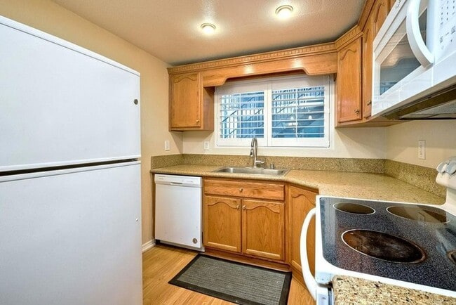Photo - First-Floor 2BR Condo with Pool Access & Covered Parking in La Bonita Unit 107