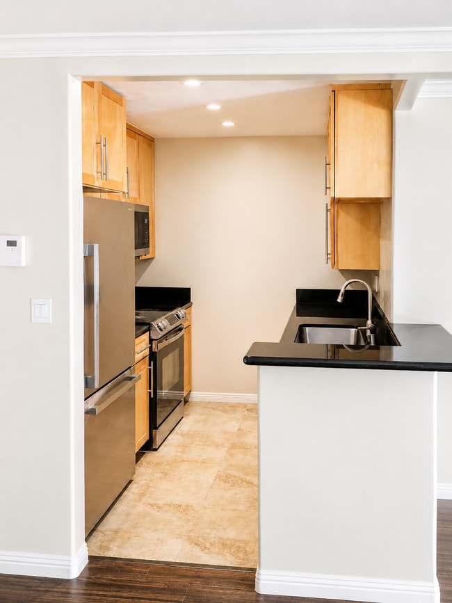 Kitchen: Updated kitchen with new KitchenAid appliances. - 6191 Rancho Mission Rd Unit 108