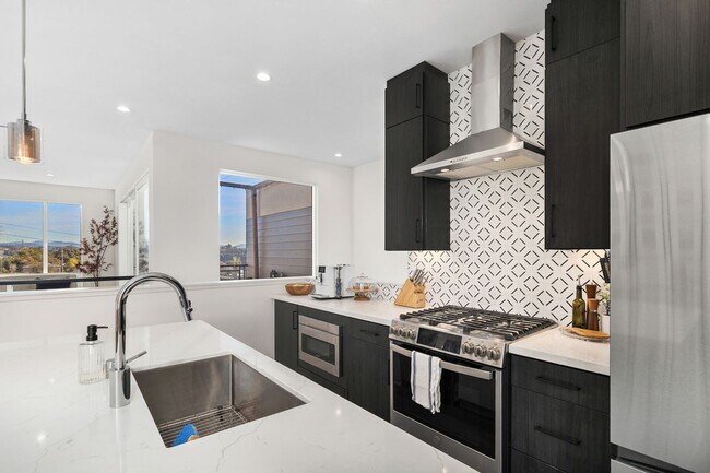 Photo - Beautiful upgraded 3 bedroom townhome with 2 car garage!