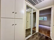 Linen cabinets/ closet hallway - Terraces At the Oaks Apartments