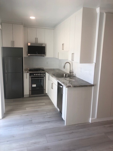 Building Photo - 1014 Thompson Ave Unit 1