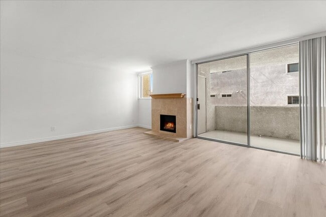 Photo - Bright Upper Level Encino Condo with Balcony, Fireplace, and Resort-Style Pool Unit 232