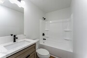 Newly Updated Bathroom and Fixtures - The Sophia at Mt. Helix Apartments