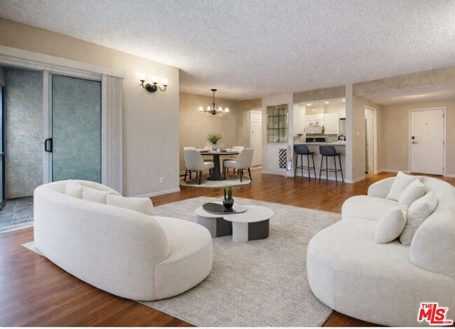 Building Photo - 6225 Canterbury Dr Unit 306