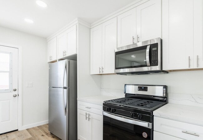 Photo - Welcome to your beautifully renovated single level home in the heart of Oceanside! Unit 305 Holly St.