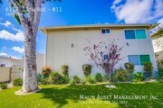 Lawn/outside pov - 6107 - 6117 11th Ave Apartments