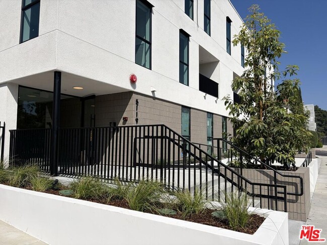 Building Photo - 5119 Colfax Ave Unit 201