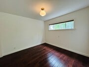 Photo - Spacious One Bedroom + Den Backhouse! In Unit Laundry! Prime Location!