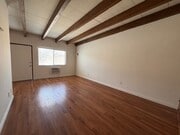 Photo - Large and Bright Studio with wood ceiling beams and floors... Unit Cordova St 216 C