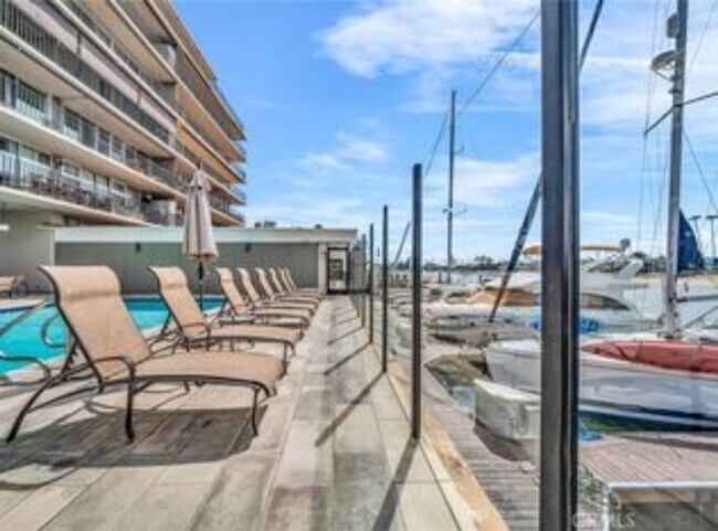 Photo - Spacious 2 Bedroom 2 Baths Condo with Water Views, Pool, and Parking! Unit 509