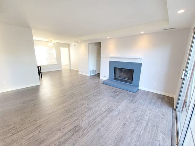 Large family room with fireplace - 6530 College Grove Dr Condo