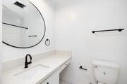 2BD, 2BA - 900SF - Primary Bathroom - South Gramercy Place LLC Apartments