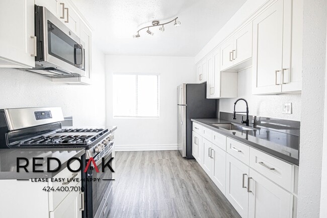 Building Photo - 12520 Lakewood Blvd Unit 13 Rental