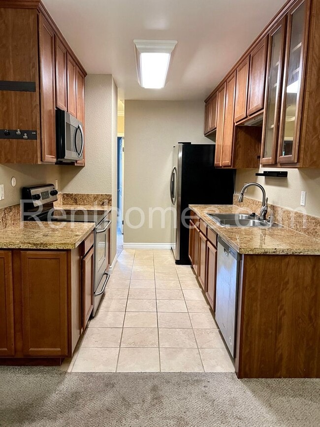 Building Photo - 9929 Azuaga St Unit F201