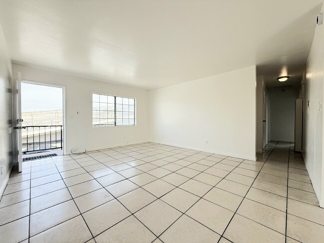 Photo - Bright & Spacious Upper Unit with 3 Bedroom, 2 Bath and assigned Parking space Unit D