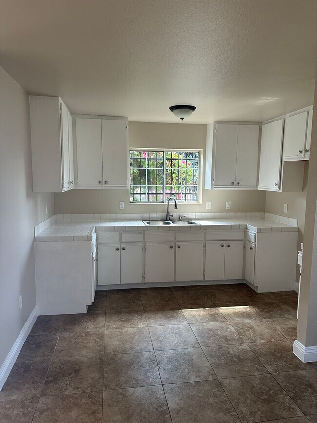 Photo - 647 1/2-1619-1612 E 111th St Unit 1619