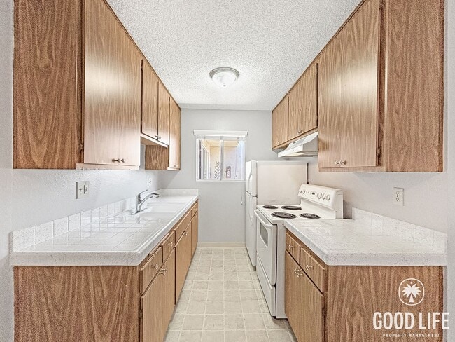 Photo - Comfortable 1BD/1BA Upper-Level Condo in North Park with Reserved Parking & On-Site Laundry Unit 4