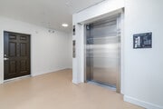 Lobby Elevators - South River Village Apartments