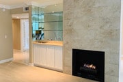 Fireplace, wet bar - 2345 Roscomare Rd Condo Unit 20