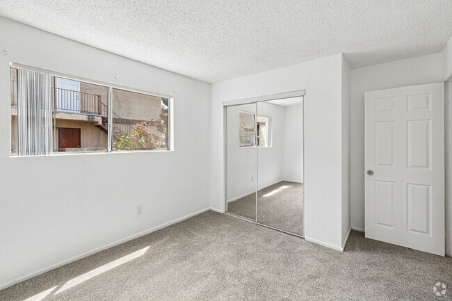 2BR, 2BA - 924SF - Primary Bedroom - Whitaker Apartments