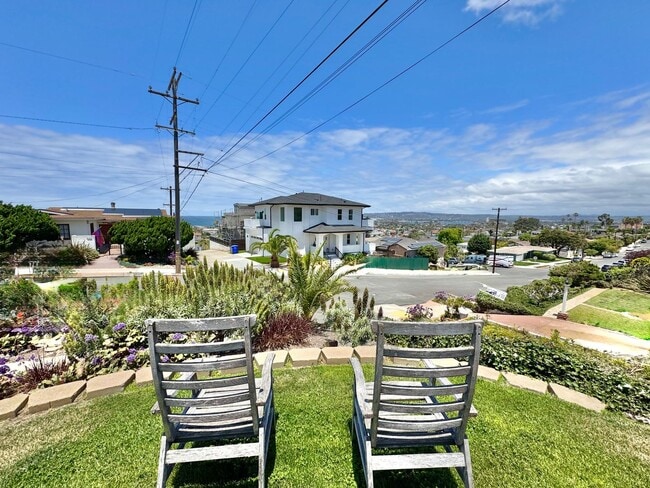 Photo - 3bd/1ba OB Home with OCEAN VIEWS! Hardwood floors, fenced yard, garage, laundry!
