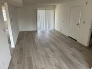 Living area and entry - 18071 Beneda Ln Apartments Unit 206