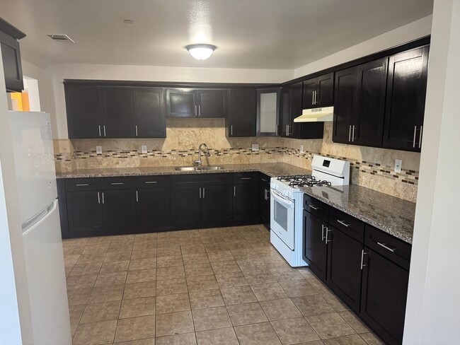 Photo - 430 1/2 W 59th Pl Apartments Unit 430