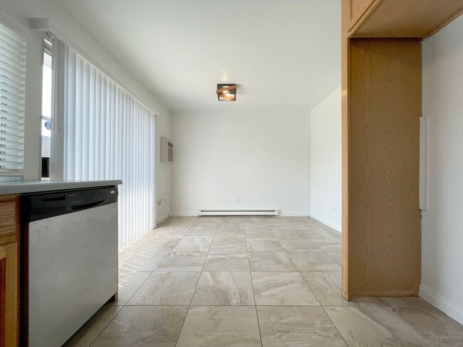 Photo - 3 Bed + 1.5 Bath + 2 Car Garage Unit B