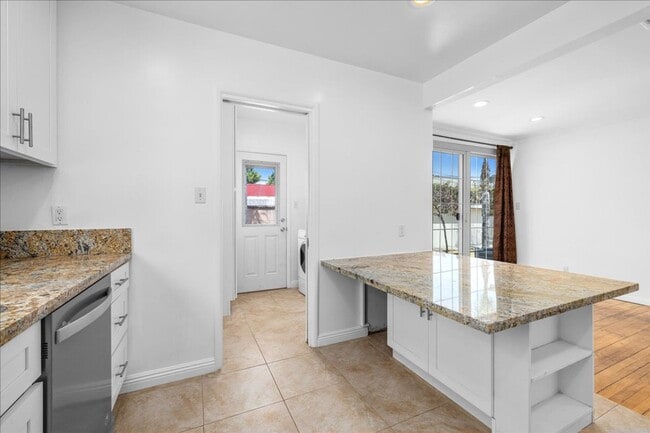Photo - Corner lot home on a classic tree lined Beverly Hills street