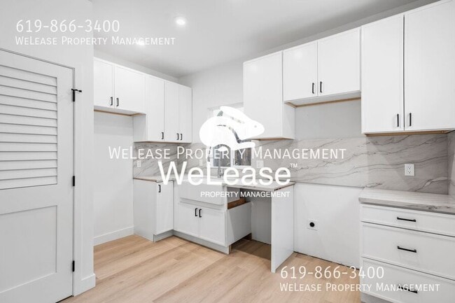 Building Photo - 5966 Carnegie St Unit 4