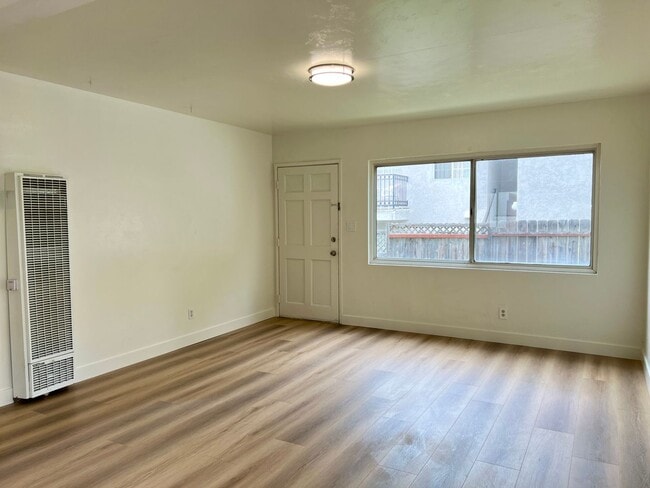Photo - 2BD 1BA Apt Next to USD - Spacious Downstairs Unit, Pet Friendly, 1 Parking Space, No Carpet Unit 5838
