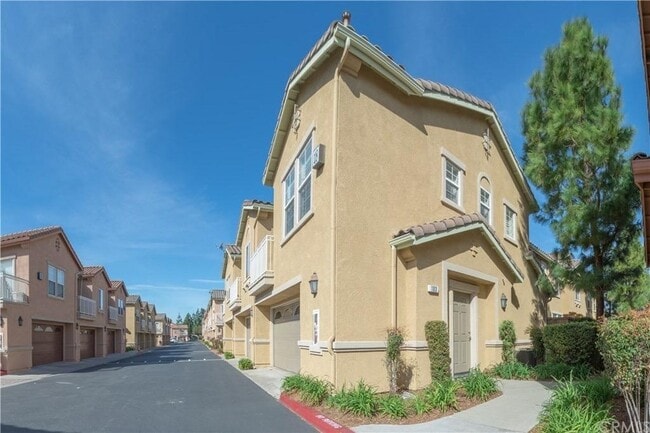 Building Photo - 11450 Church St Unit 103