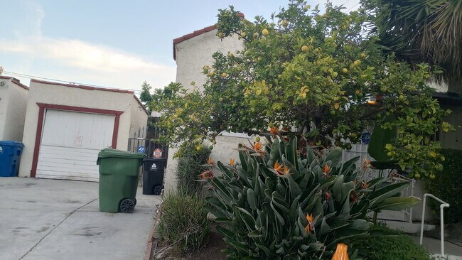 partial front of house and detached garage - 7967 Clinton St