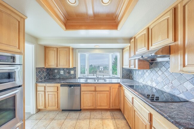 Photo - Single-story living with incredible panoramic sunset, mountain, and city light views