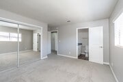 2BR, 2BA - 1,015SF - Primary Bedroom - Watercrest at the Polo Fields