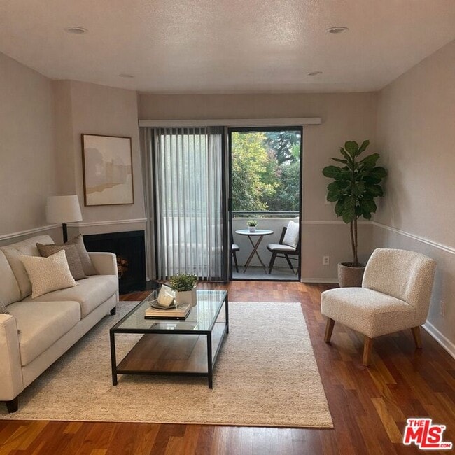 Building Photo - 12211 Idaho Ave Unit 103