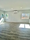 Living area without furniture - 5451 Brynhurst Ave Unit 5451 Brynhurst Ave.