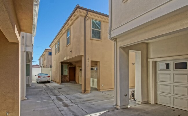 Building Photo - BUILT IN 2019: SPACIOUS & BRIGHT, DETACHED TOWNHOUSE W/ 2-CAR GARAGE & FENCED YARD IN GREAT RESID...