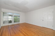 2BR, 1BA - 900SF - Living Room - 11641 National Blvd