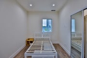 Photo - 1219 W 25th St Apartments