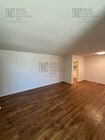 Photo - Spacious 3-Bedroom Home with Sunroom & Upg...