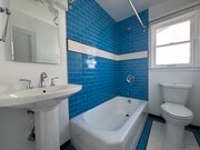 Fresh and bright retro-modern bathroom - 554 E Cypress Ave Apartment Unit B
