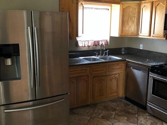 Photo - "Charming 3-Bed Gem with Granite & Hardwoo...