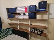 Built in shelving with storage bins and books - 1608 Paraiso Dr