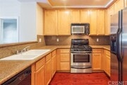Photo - 9610 Zelzah Ave Condo Unit 103