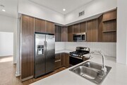 Full-Size Kitchen with Ample Cabinet Storage and Vinyl Flooring - Cole Grove by Wiseman