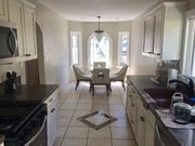 Kitchen with breakfast area - 1350 S Curson Ave House