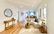 Living room and kitchen, facing west. - 1334 Pennsylvania Ave Unit B