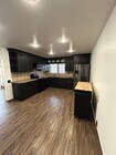 Photo - Beautifully Updated 3-Bedroom Townhome with Fireplace, Private Patio & Community Pool $3,495